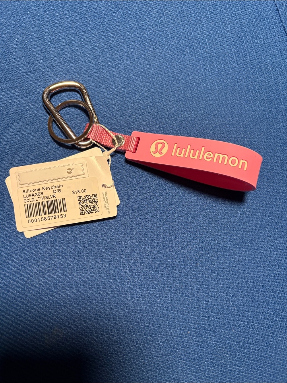 Lululemon Silicone Keychain NWT in the SOLD OUT Candy Cloud.